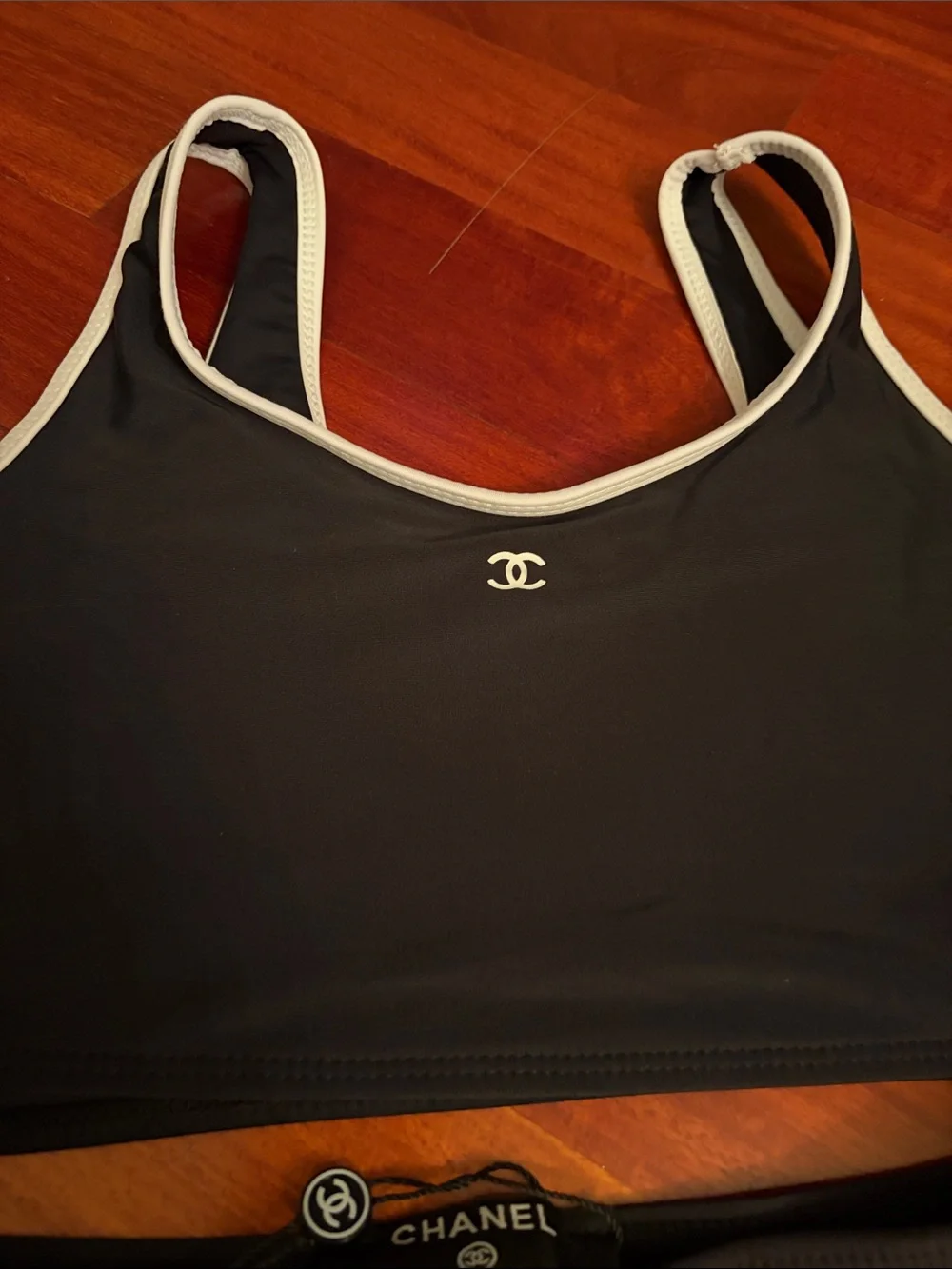 Black Bikini Top and High-Waist Bottoms with White Trim
